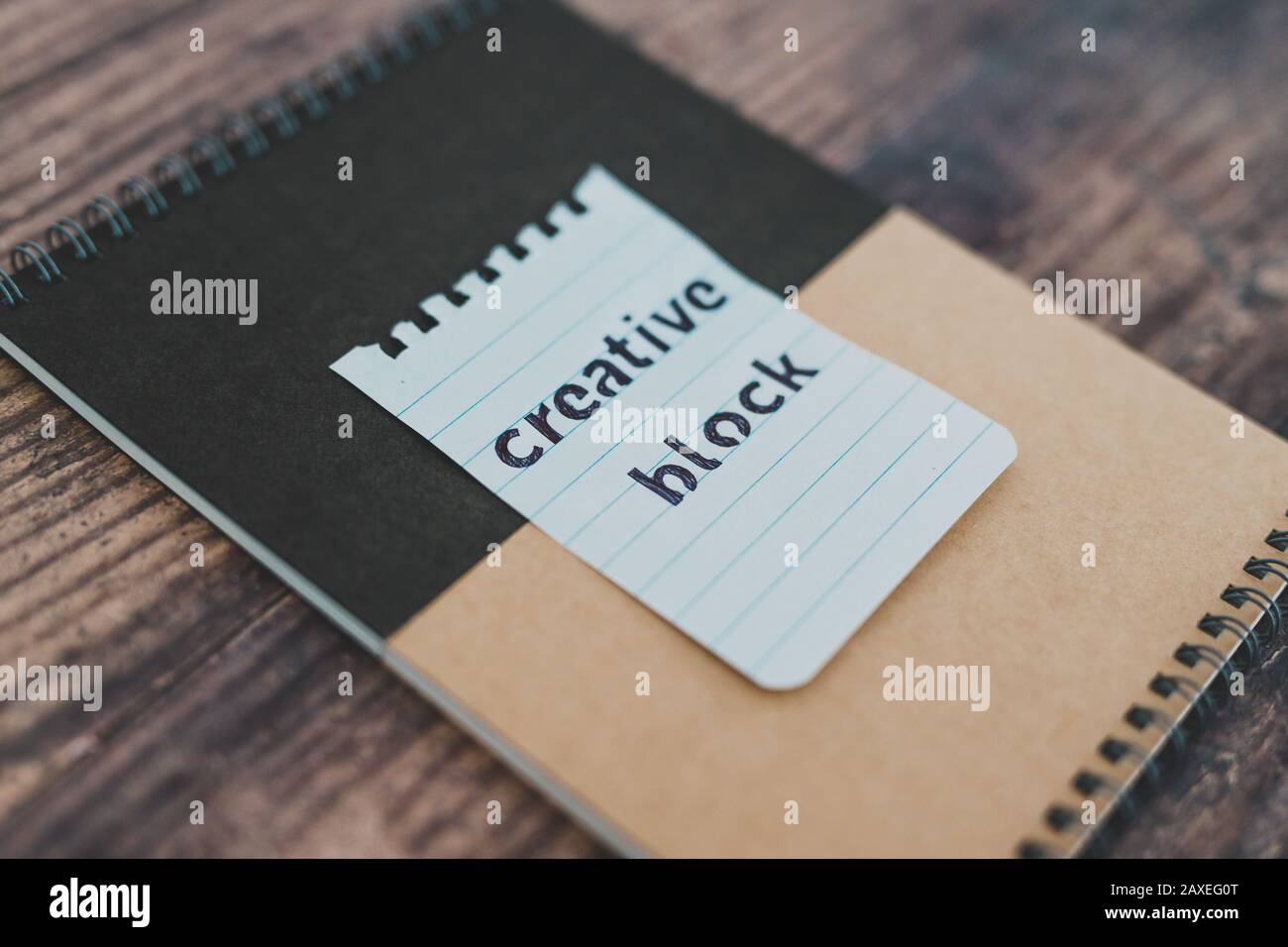 creative block or writer's block conceptual still-life, notepads on ...
