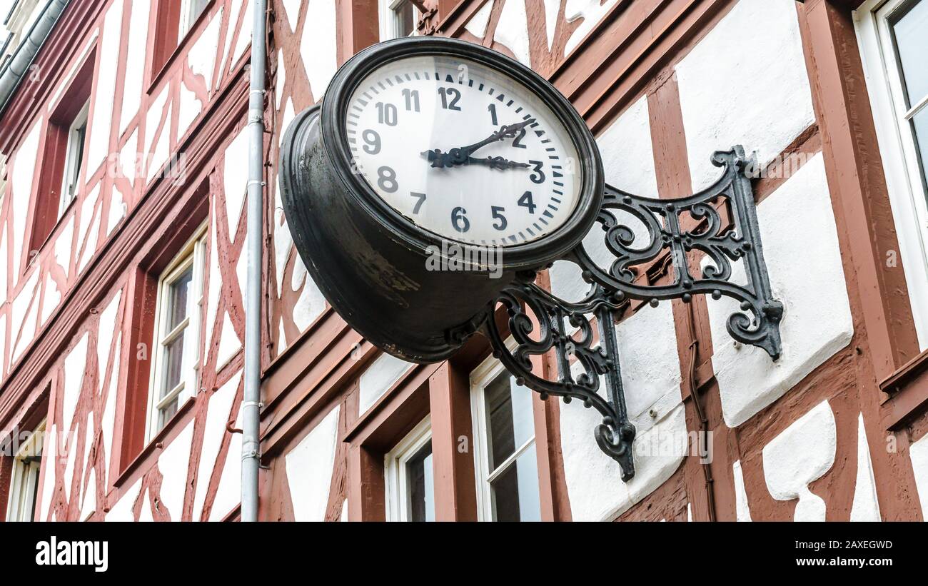 Vintage Clock on a house facade in Germany Stock Photo Alamy