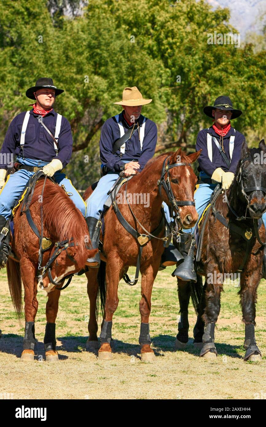 Renactors dressed in the uniform of the 1880s US Army soldiers in the ...