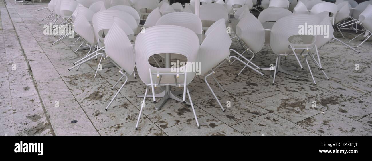 Plastic Chairs Around Tables In A Restaurant, Stuttgart, Baden-Wurttemberg, Germany Stock Photo