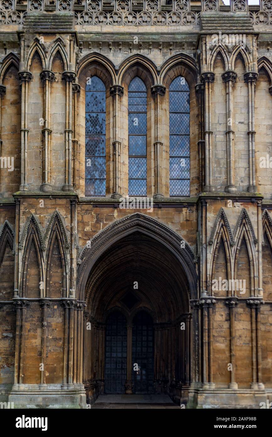 Closeup shot of the entrance of the Lincoln Cathedral in the UK on a rainy day Stock Photo