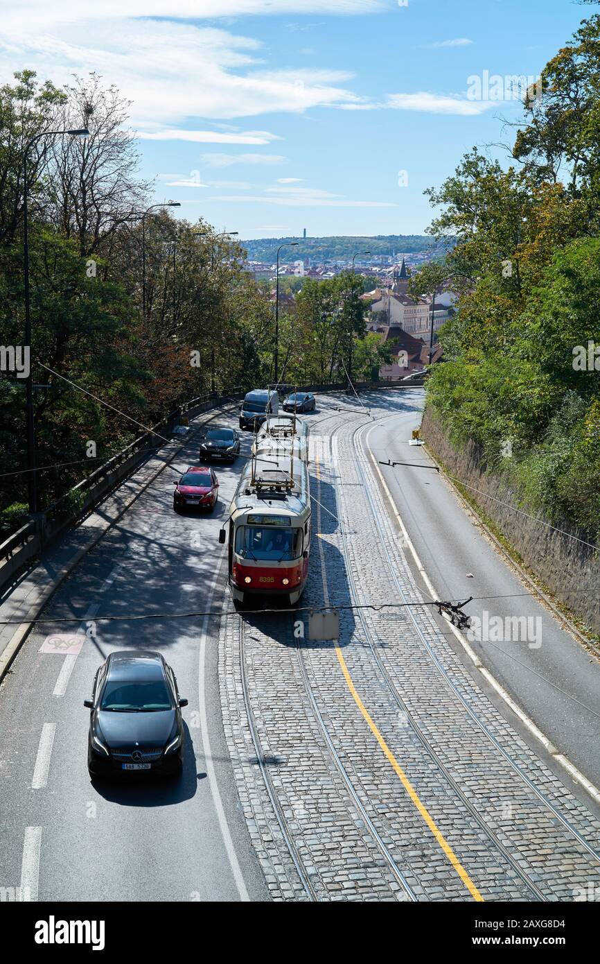 Road traffic with cars and tram at Chotek Park (Chotkovy sady) in Prague Stock Photo