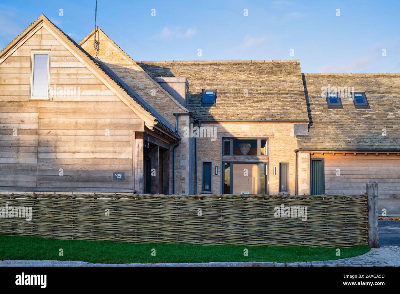 Afternoon winter sunlight on a house in Bledington, Cotswolds, Gloucestershire, England Stock Photo