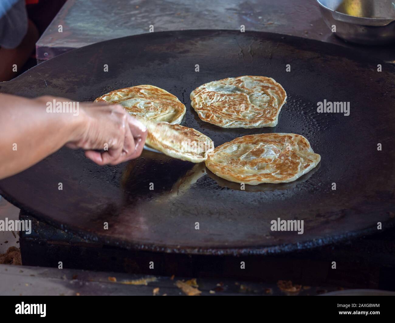 Roti Making, roti thresh flour by roti maker with oil. Indian ...