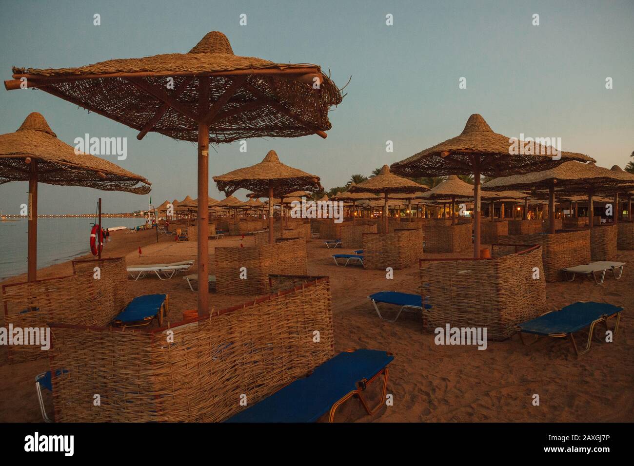 umbrellas on the egyptian evening beach Stock Photo Alamy