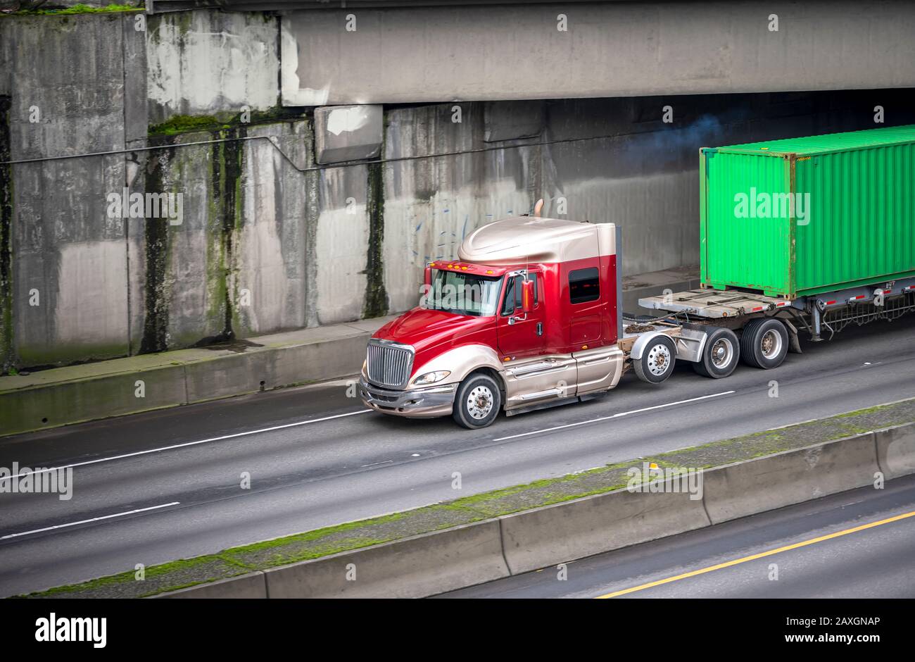 Big rig low cab to improve aerodynamics long haul red semi truck
