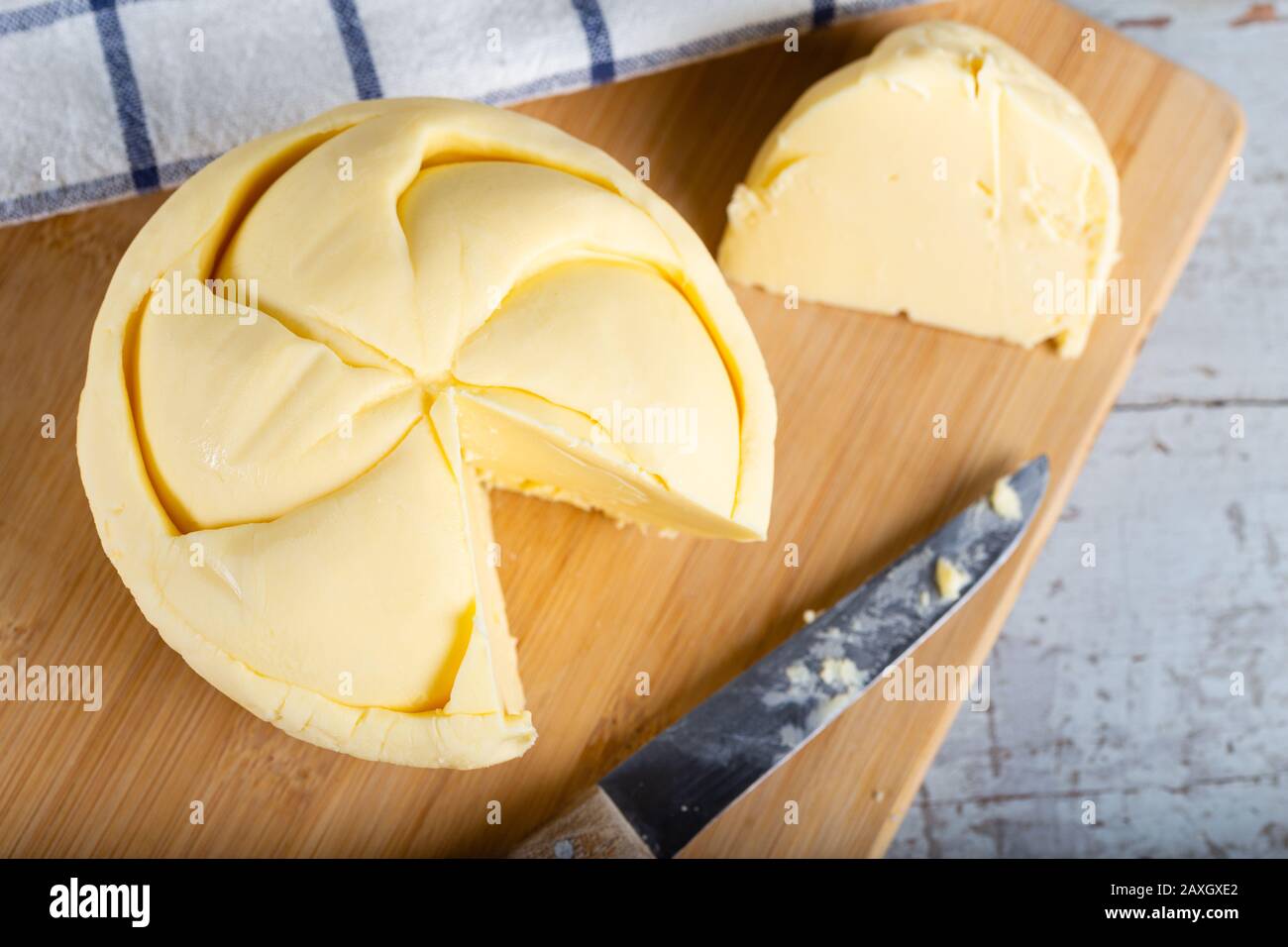 Sliced fresh butter on wooden background Stock Photo Alamy