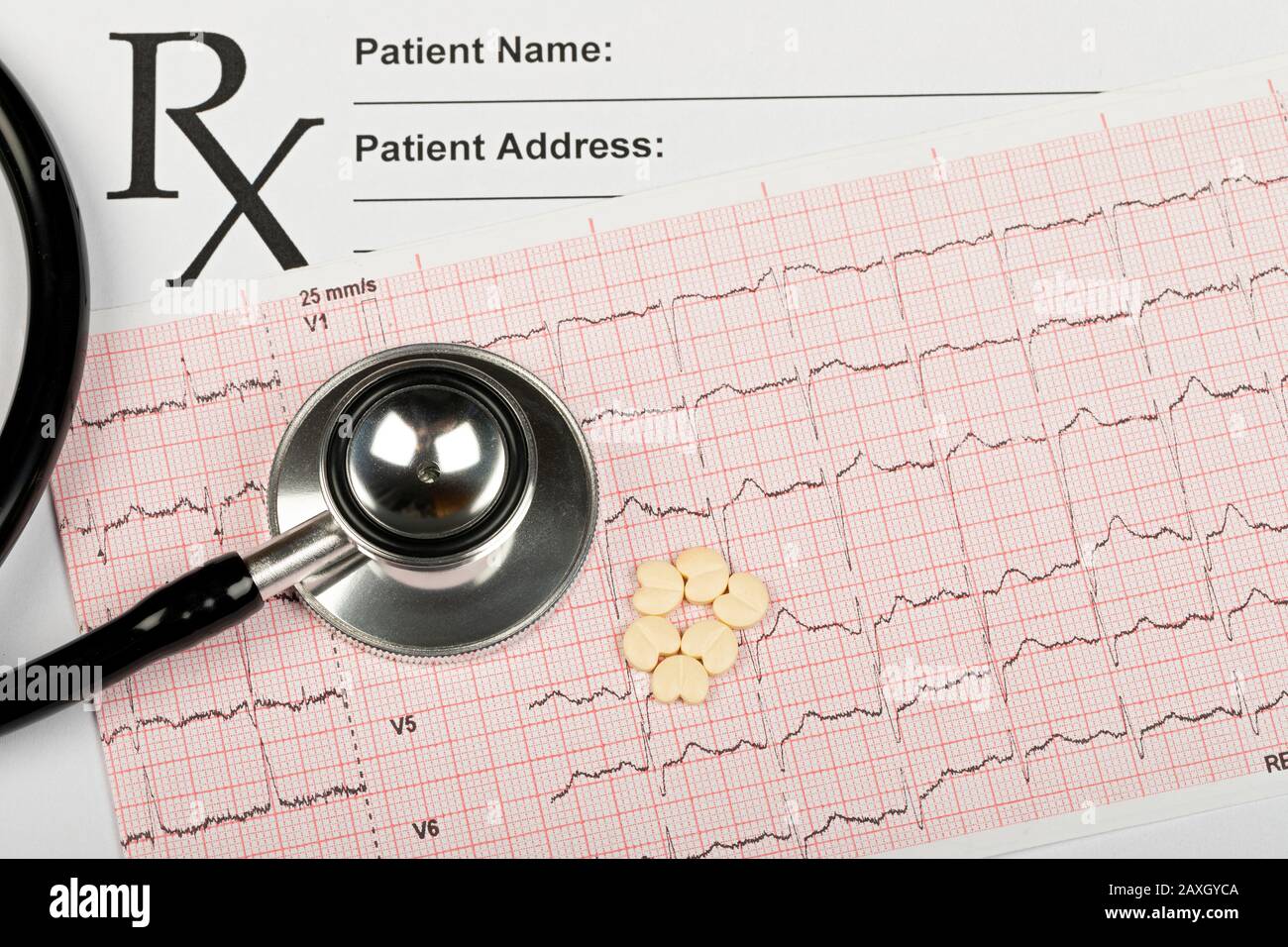 Electrocardiogram graph report with stethoscope on it Stock Photo