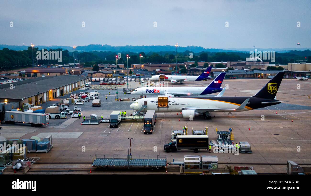 Harrisburg , Pennsylvania / United States - 08 16 2019: Busy morning at Harrisburg International Airport's cargo terminal area, UPS and FedEx cargo Stock Photo