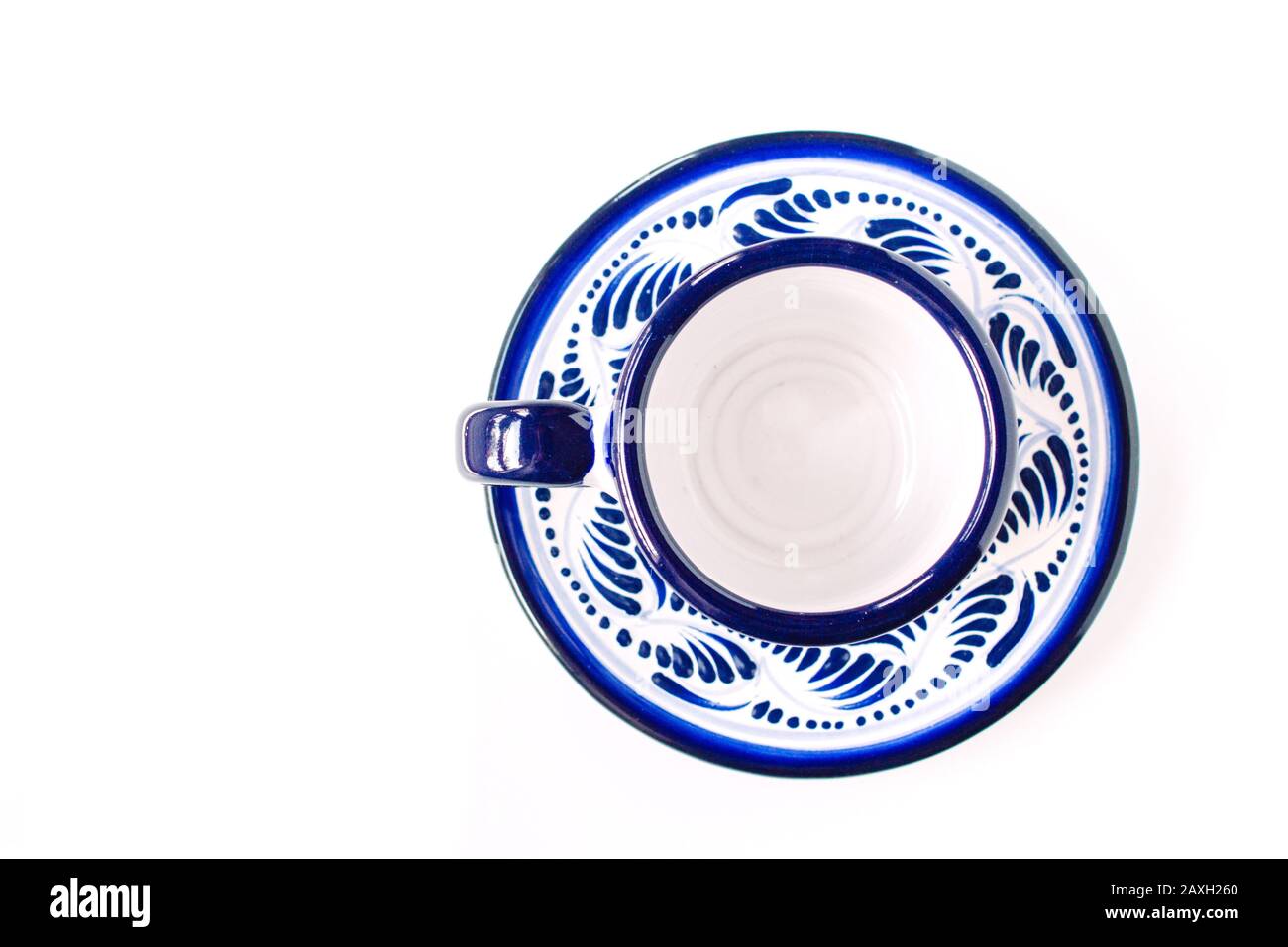 Mexican pottery, named talavera poblana on a flat lay view. white background with empty space for text Stock Photo