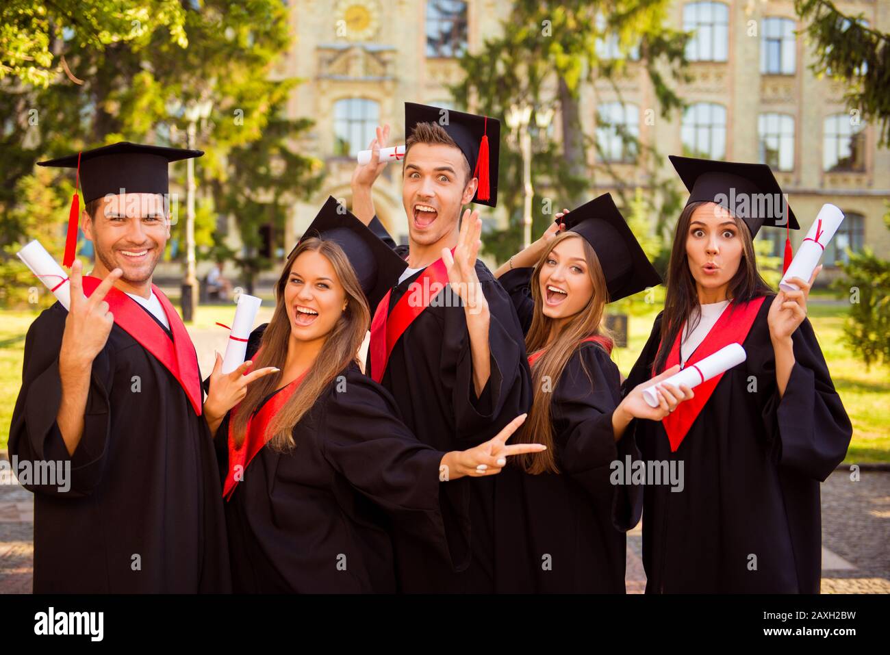 Graduates high five hi-res stock photography and images - Alamy
