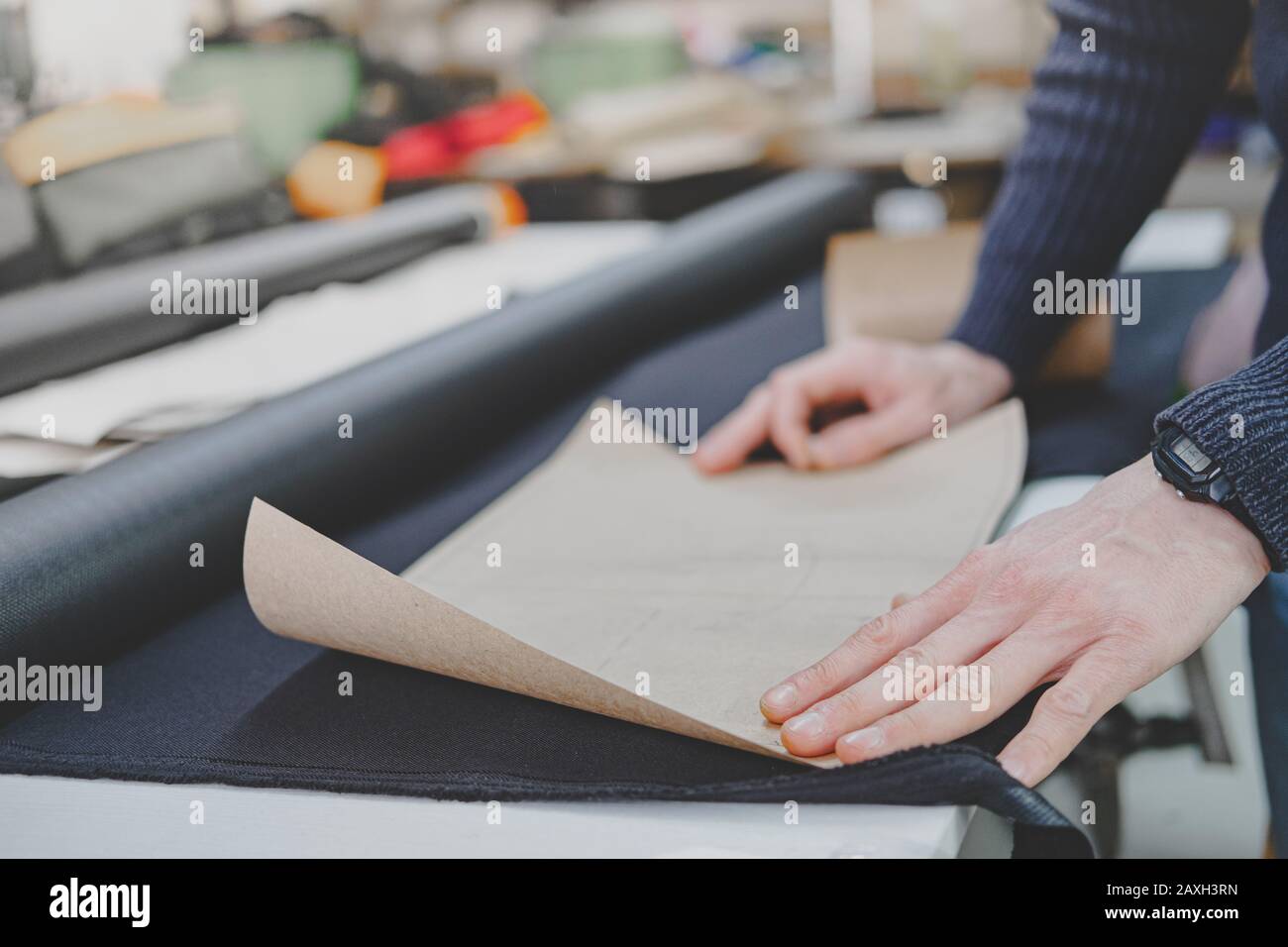 Hands of a worker doing engineering job. Manual labor process, business ...