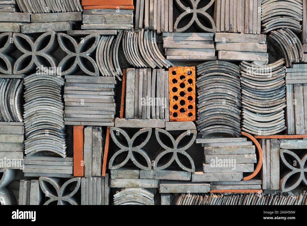 Pattern of roof tiles and bricks Stock Photo