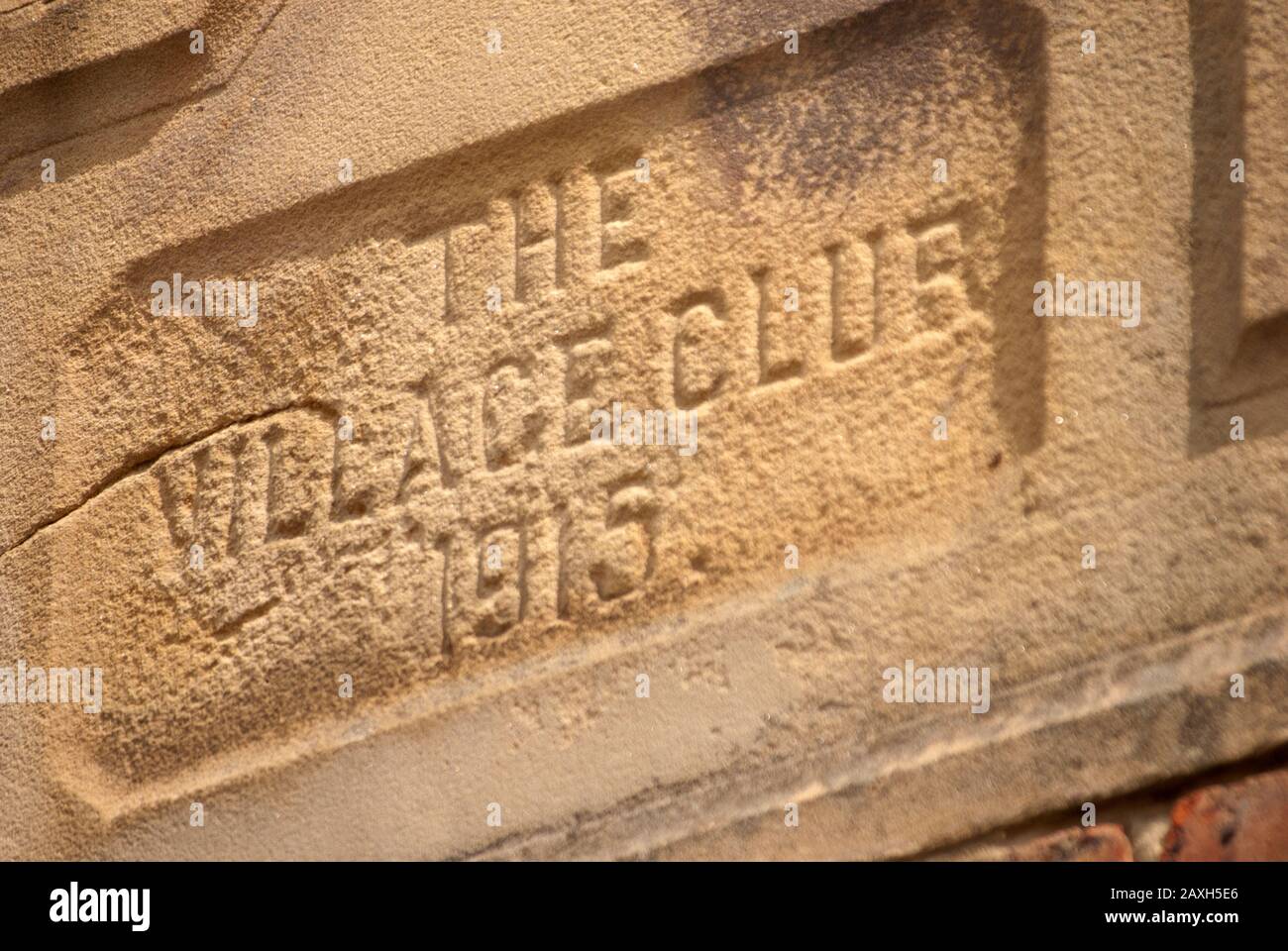 Carving in wall of the village club, Great Ayton, North Yorkshire Stock Photo Alamy