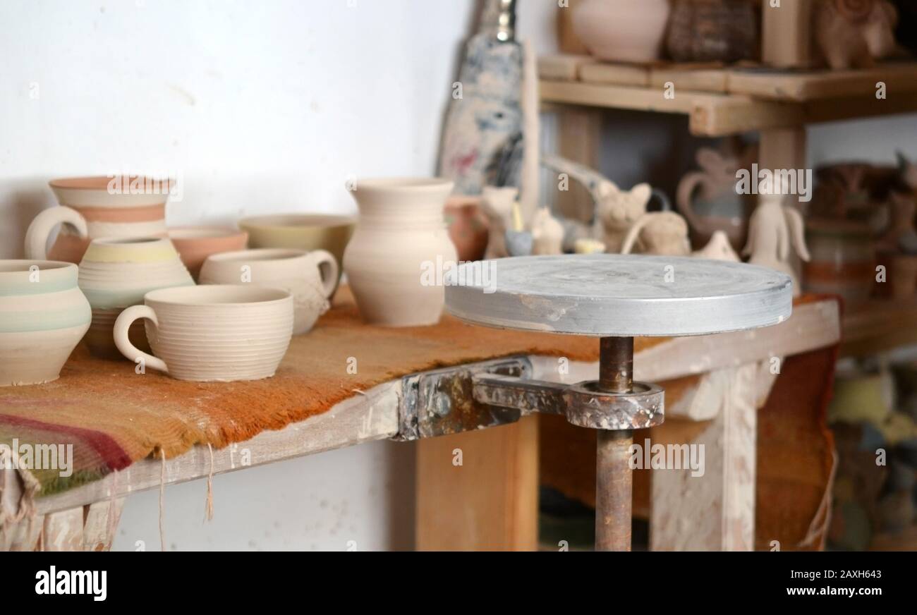 Interior pottery inside. Workplace of a potter. Working circles and