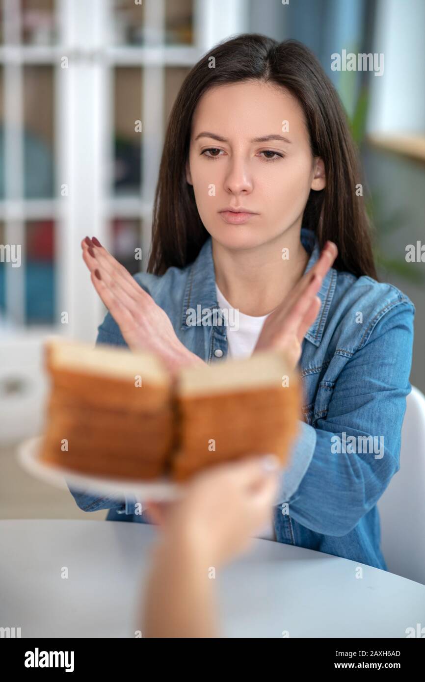 Refusing to eat woman hi-res stock photography and images - Alamy