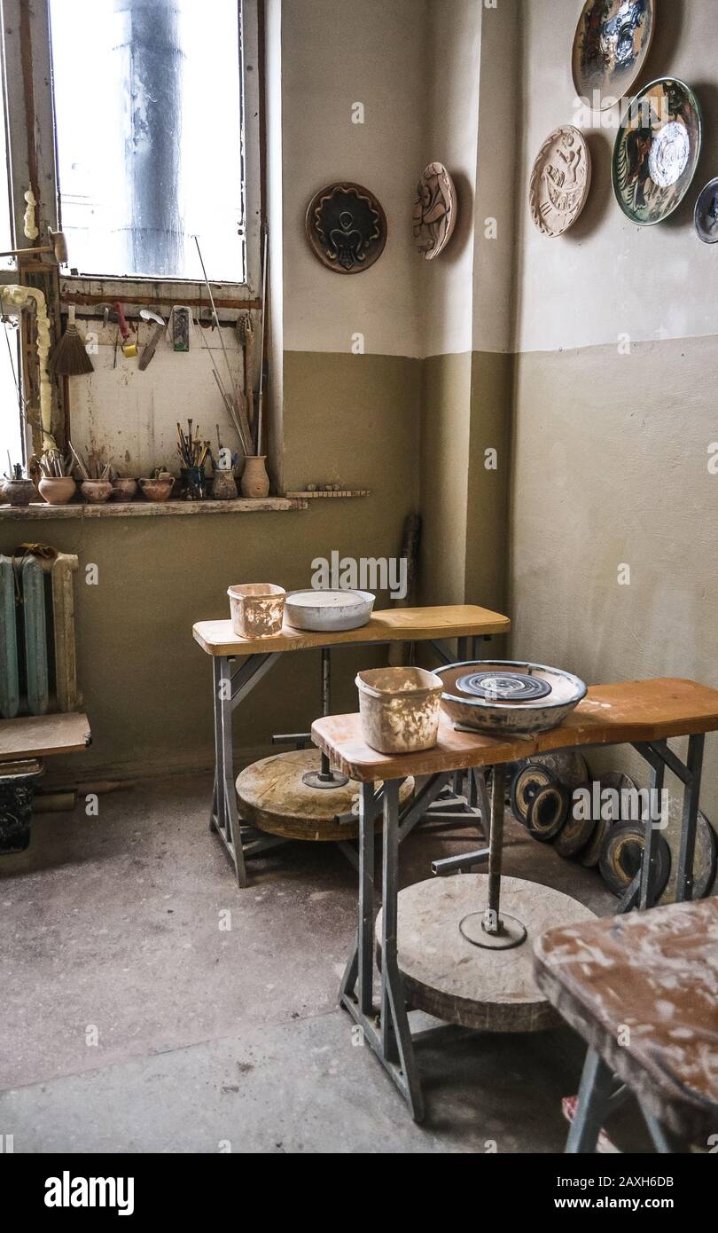 Interior pottery inside. Workplace of a potter. Working circles and