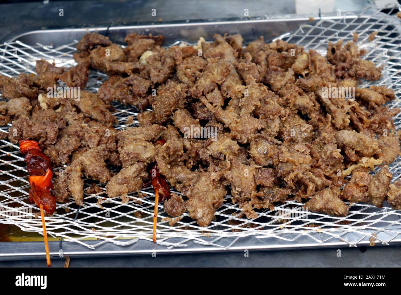 Photo of deep fried pork liver with breading sold at a street food