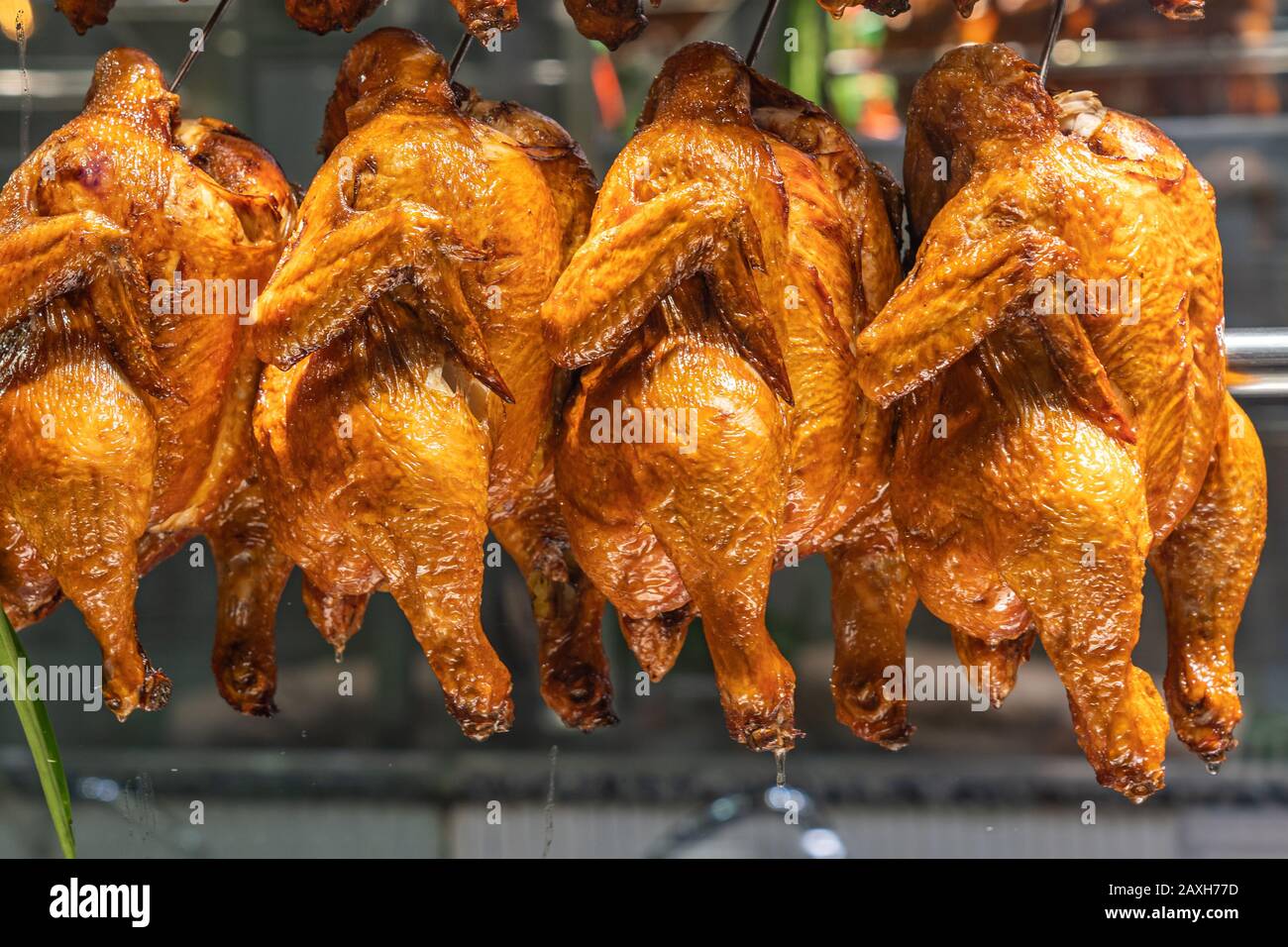 Closeup photo of roasted whole chickens at Chinese restaurant's