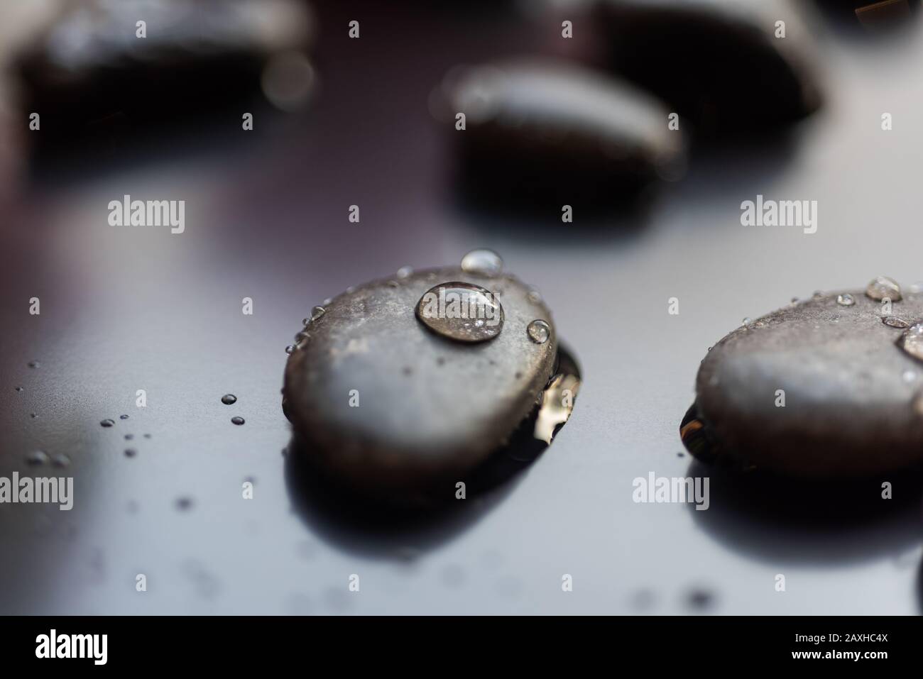 Water droplet on pebble concept Stock Photo