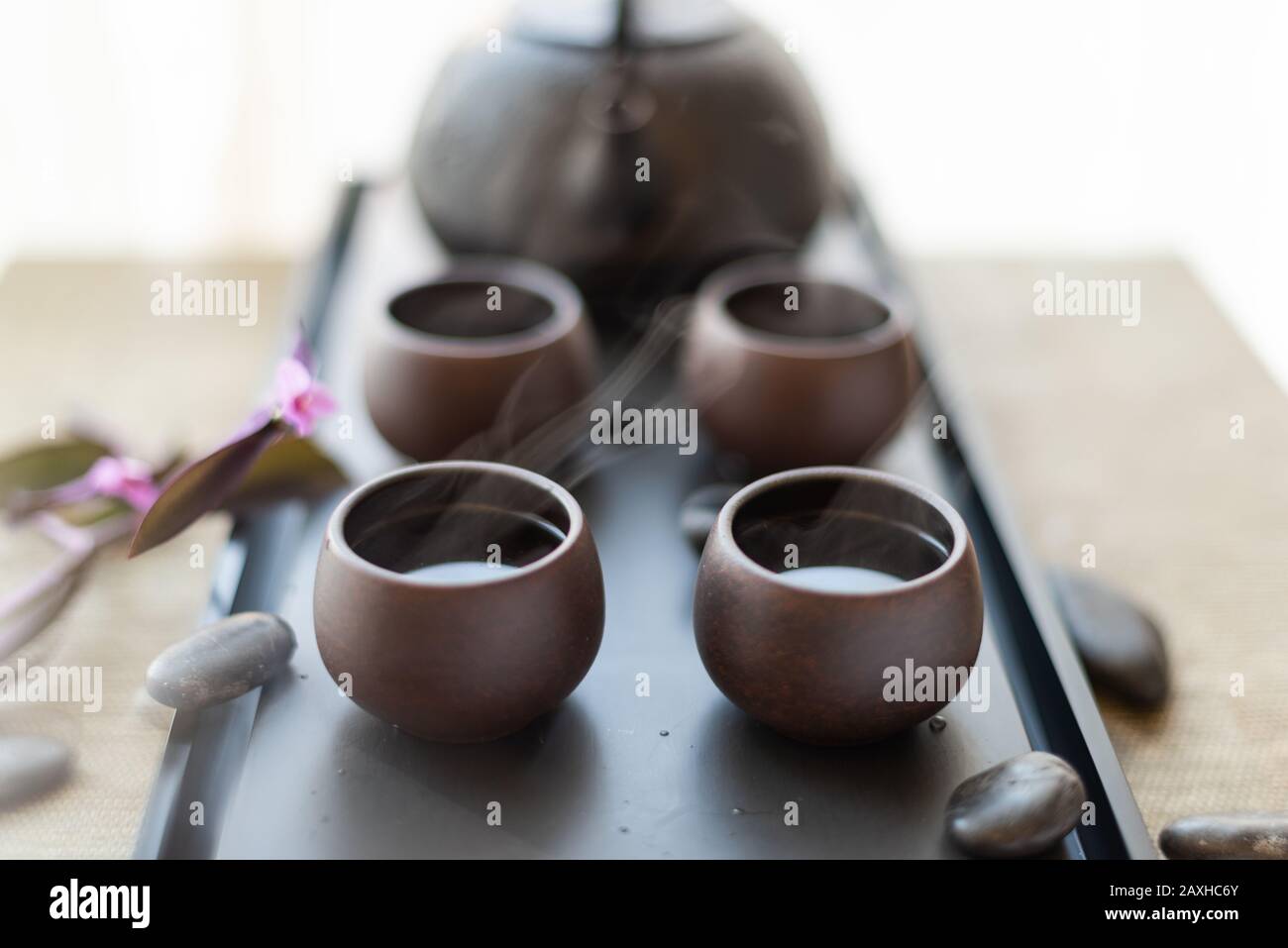 Traditional Chinese tea Set up with ceramic tea cups Stock Photo