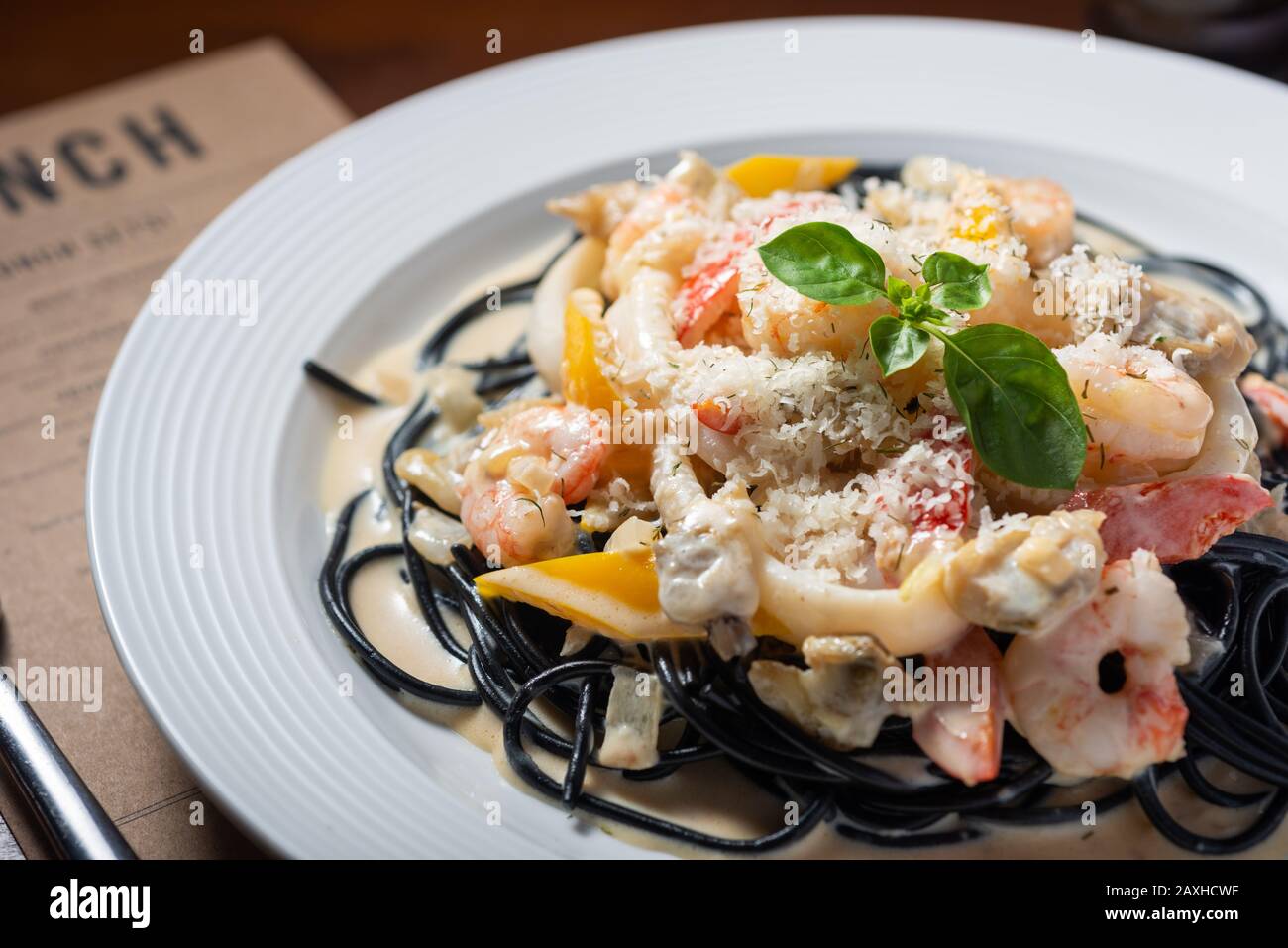 Seafood Ink noodle pasta with shrimp and squid Stock Photo
