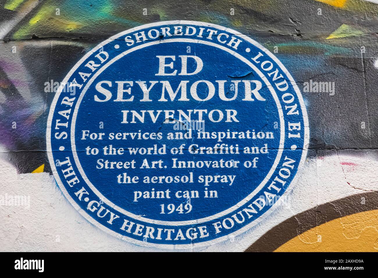 England, London, Shoreditch, Wall Art depicting Blue Plaque for Ed Seymour Inovator of the Aerosol Spray Paint Can in 1949 Stock Photo