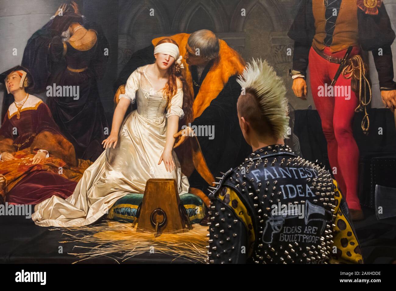 England, London, Trafalgar Square, The National Gallery, Punk Visitor in Front of Painting  titled 'Execution of Lady Jane Grey' by Paul Delaroche Stock Photo