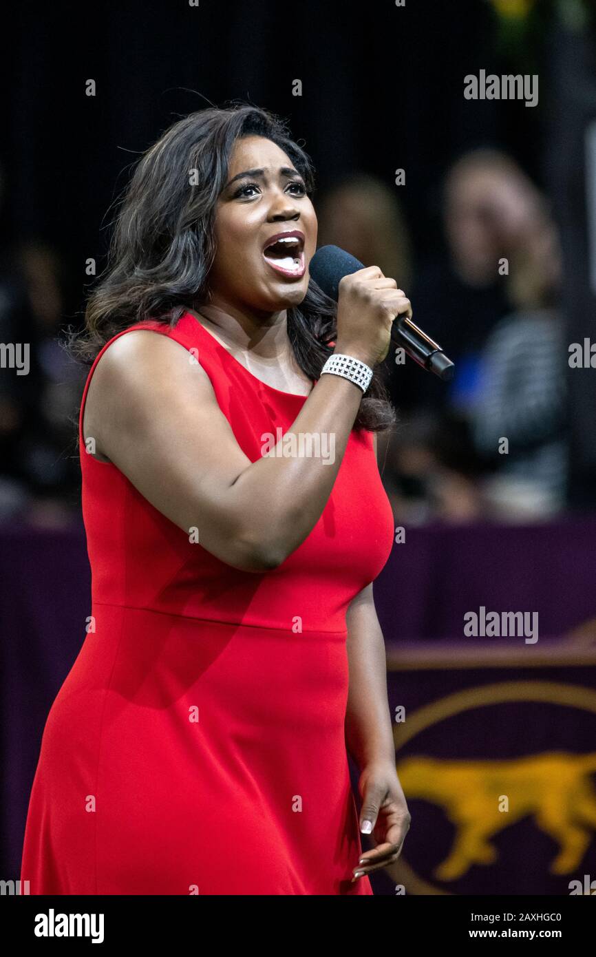 New York, USA. 11th Feb, 2020. American operatic soprano Ailyn Pérez sings the US National Anthem as the start of the final day of the 144th Westminster Kennel Club Dog show in New York city's Madison Square Garden.  Credit:  Enrique Shore/Alamy Live News Stock Photo