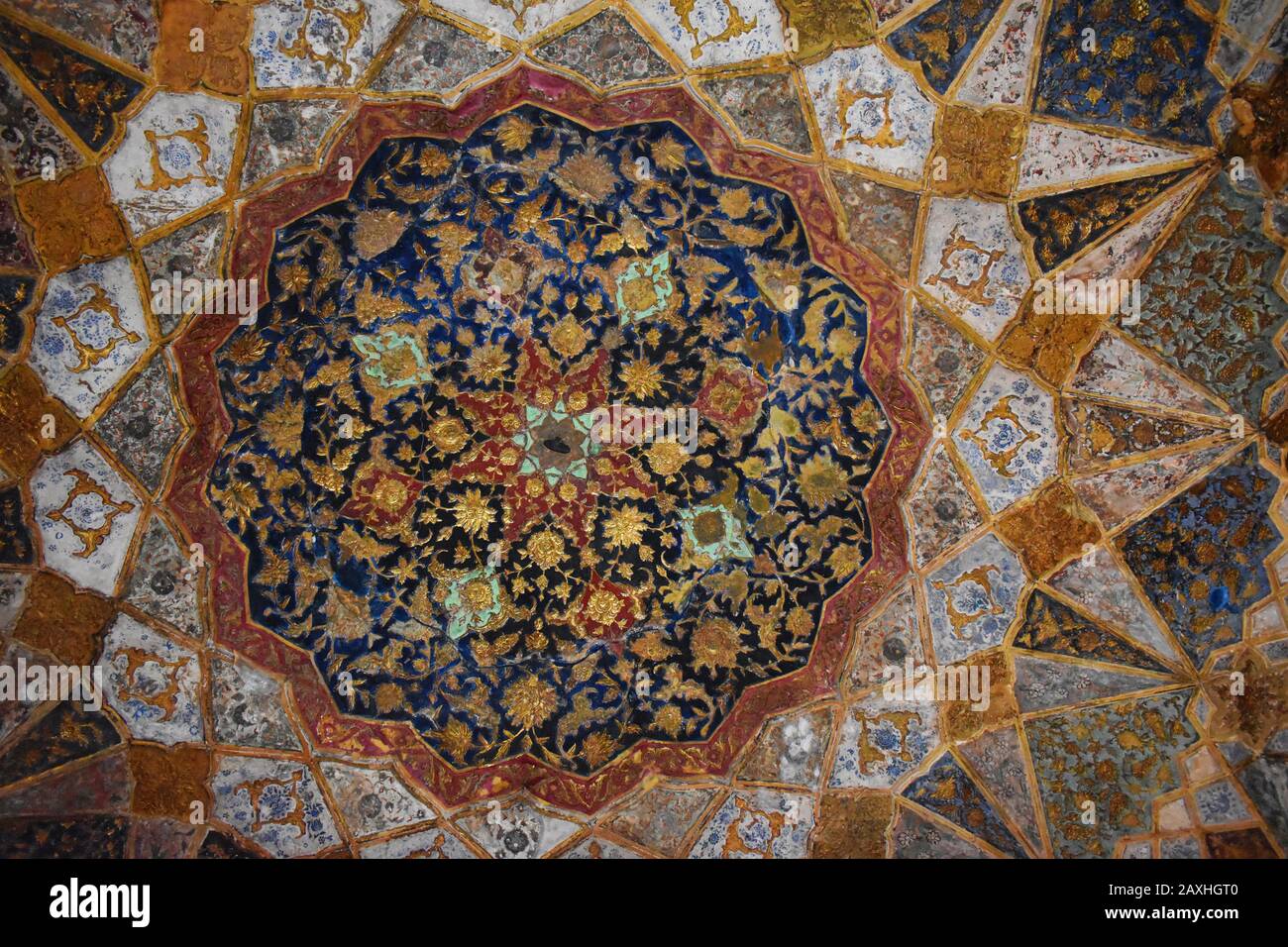 Ceiling encrusted with multi-colored stone pattern, Mausoleum of Etmaduddaula or Itmad-ud-Daula tomb often regarded as a draft of the Taj Mahal, Agra, Stock Photo