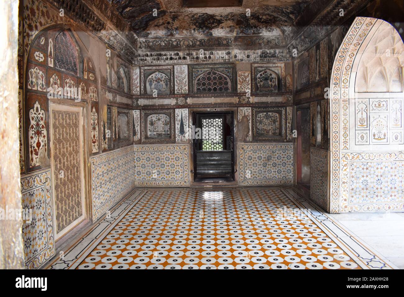 Walls and the ceilings encrusted with multi-colored stone pattern at Mausoleum of Etmaduddaula or Itmad-ud-Daula tomb often regarded as a draft of the Stock Photo