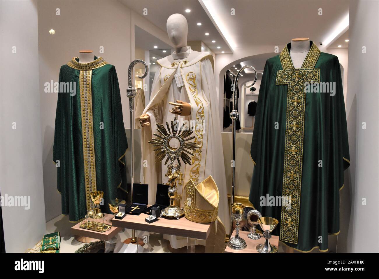 RELIGIOUS CLOTHES AND OBJECTS ON DISPLAY IN A SHOP IN THE HISTORIC