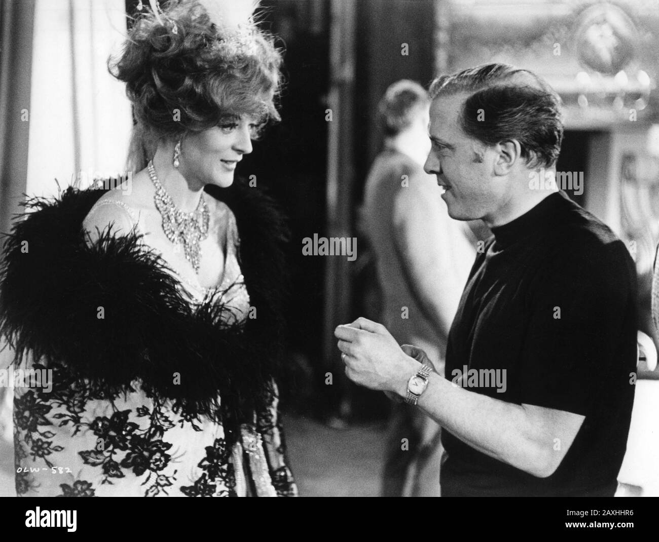 MAGGIE SMITH and Director RICHARD ATTENBOROUGH on set candid filming Music Hall sequence for OH ! WHAT A LOVELY WAR 1969 based on Joan Littlewood's Theatre Workshop Production Accord Productions / Paramount British Pictures Stock Photo