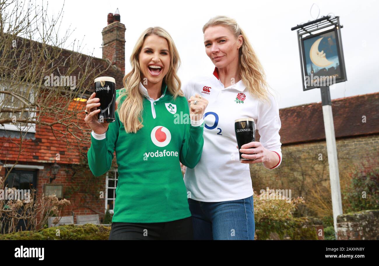 EDITORIAL USE ONLY (Left to right) Irish rugby supporter Vogue Williams and England fan Jodie Kidd enjoy a pint in Jodie???s gastropub, The Half Moon in Kirdford, to launch a VIP experience