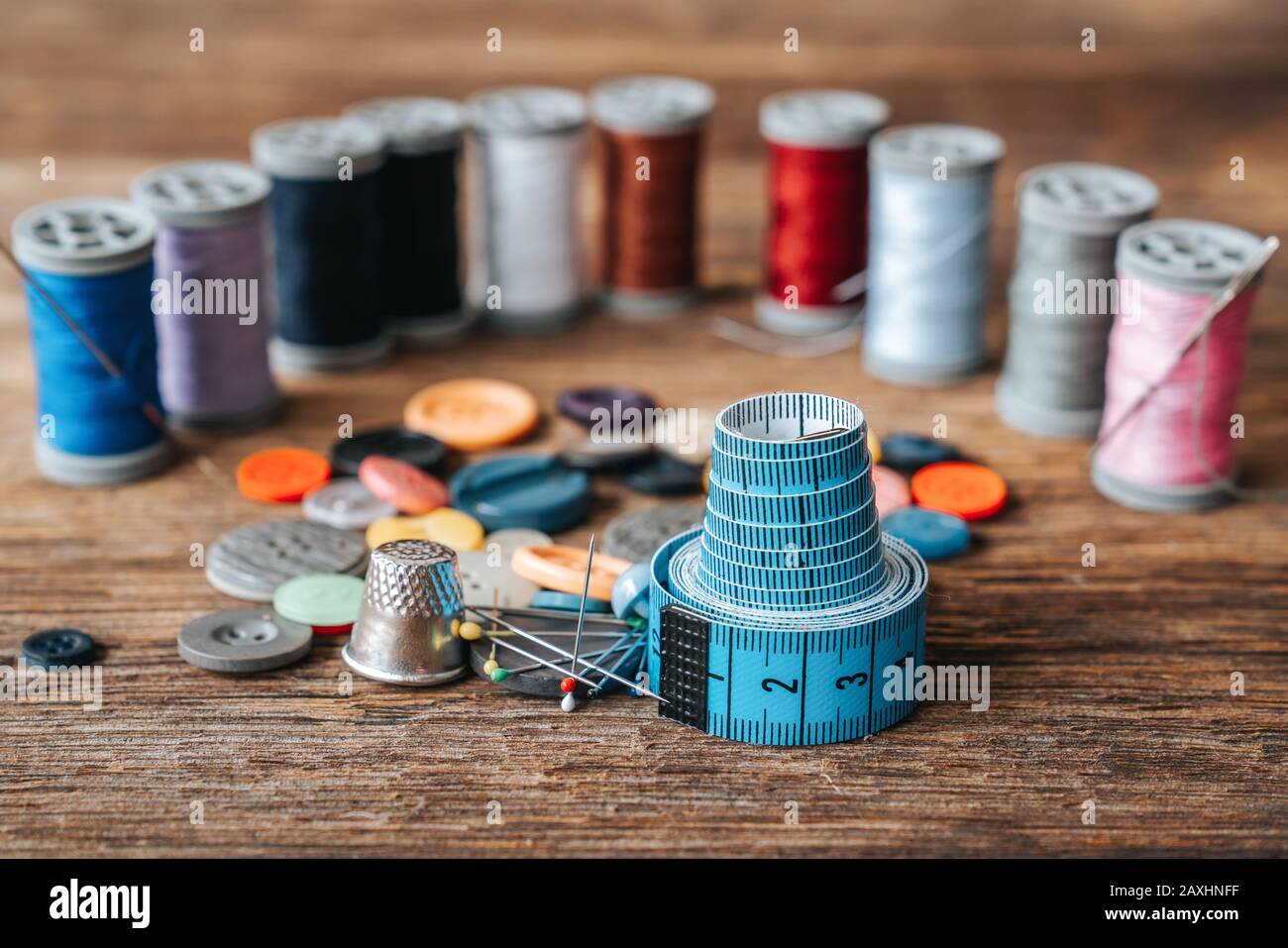 Group of objects about Sewing equipment set on a wooden background. Sewing and tailoring concept Stock Photo