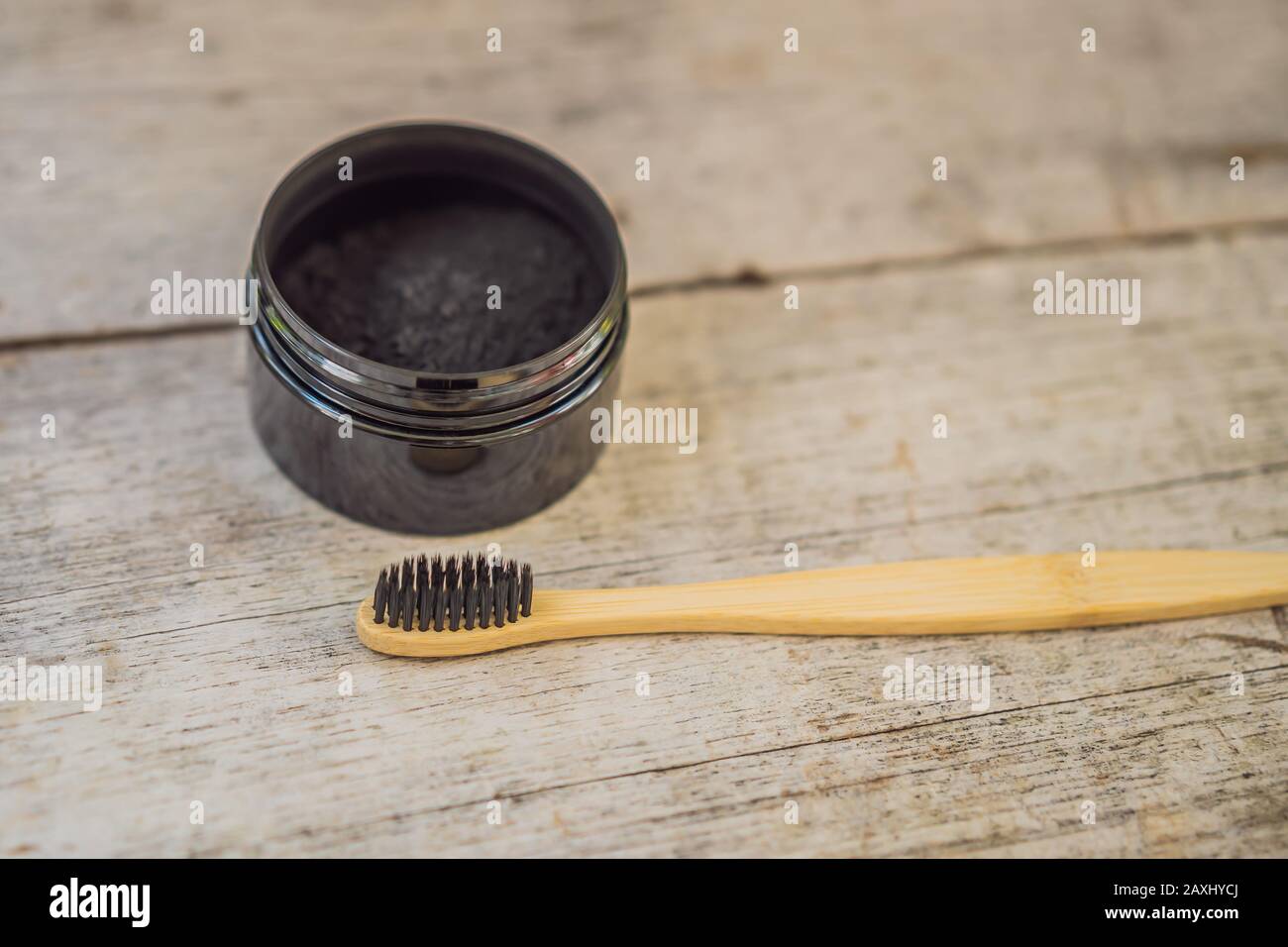Activated charcoal powder for brushing and whitening teeth. Bamboo eco