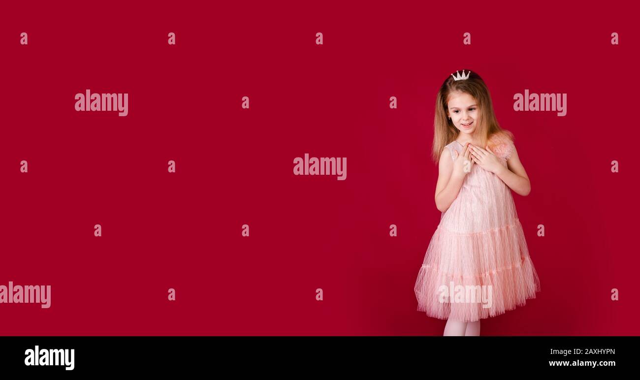 Beautiful little girl princess dancing in luxury pink and silver dress ...
