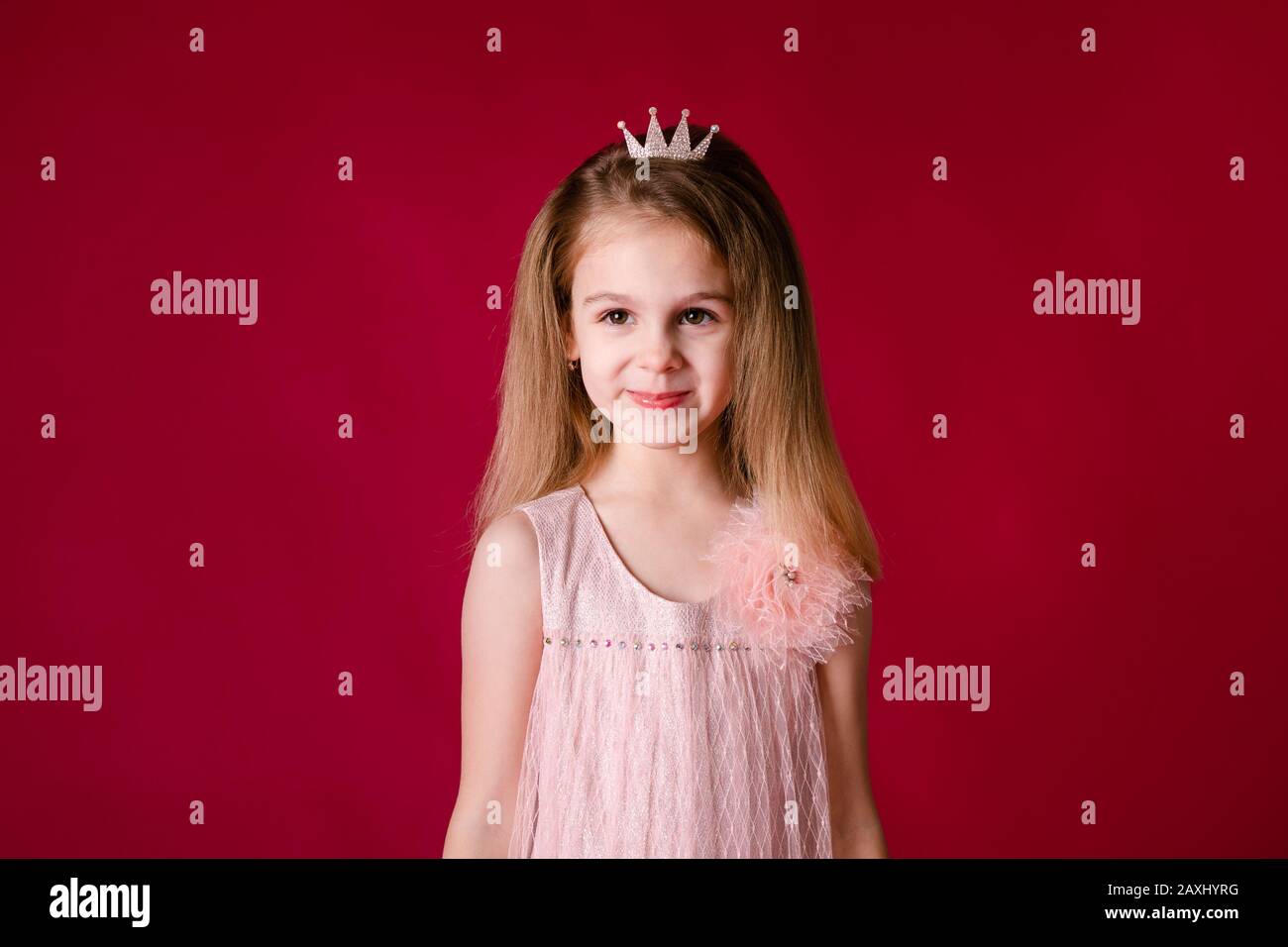 Beautiful little girl princess dancing in luxury pink and silver dress ...