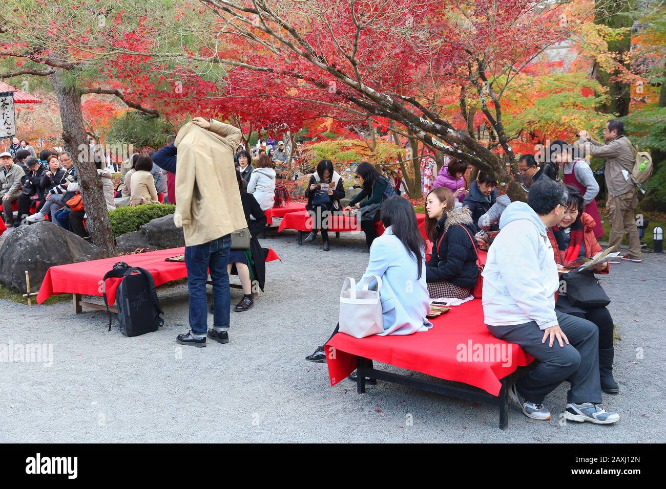 KYOTO, JAPAN - NOVEMBER 24, 2016: People visit Eikando Zenrinji temple tea garden in Kyoto, Japan. 19.7 million foreign tourists visited Japan in 2015 Stock Photo
