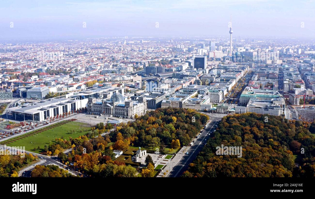 Berlin Germany’s capital aerial view. Flying above of central downtown skyline feat. famous landmarks Spree River, Great Tiergarten park and garden Stock Photo