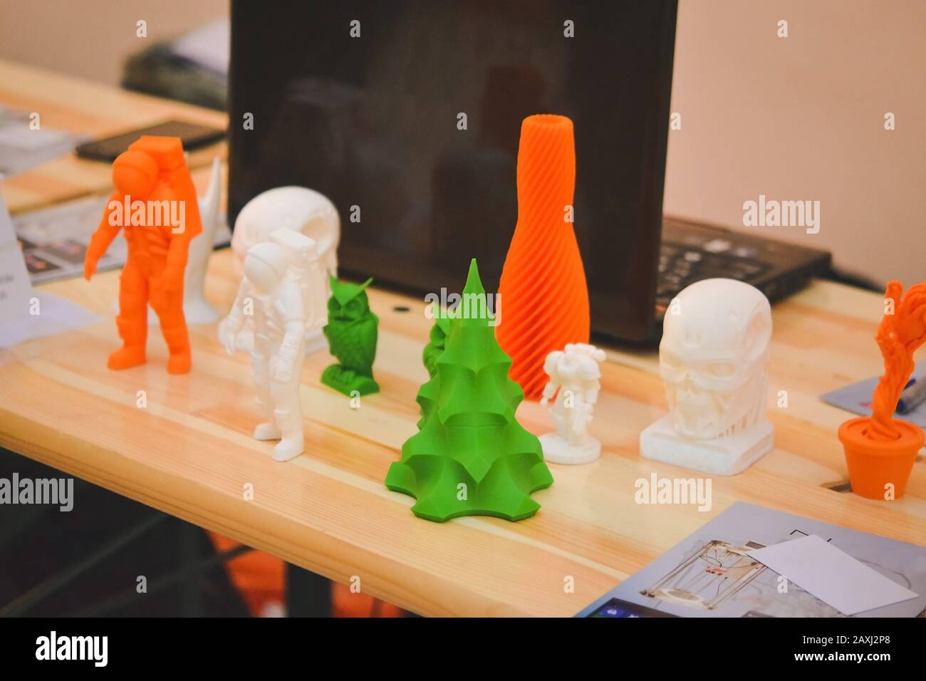 Bright colorful objects printed by a 3d printer close-up. Progressive ...