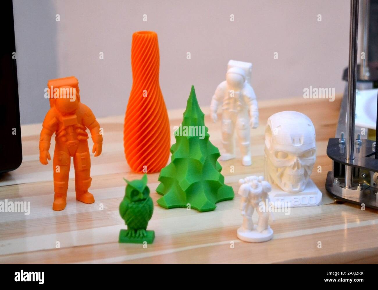 Bright colorful objects printed by a 3d printer close-up. Progressive ...