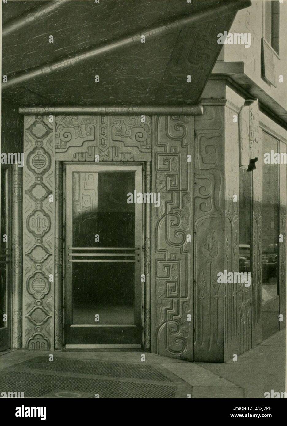Architect and engineer . DETAIL FROM ELEVATOR DOORS, FOUR FIFTY SUTTER, SAN FRANCISCOJ. R. Miller and T. L. Pflueger, Architects irreducible cross section and the interven- planted flat on the piers and little over oneing windows pushed out to the limit with- inch in thickness, including the mortar bed-out any returns, the piers themselves are ding and necessary wire ties,covered with thin flat rectangular terra In considering the exterior, it will becotta tiles scored at the back for cohesion, seen that this careful space saving plays the 48 AR.CHITECT AND ENGINFXR. April. 14,^(1. SIDE ENTRAN Stock Photo