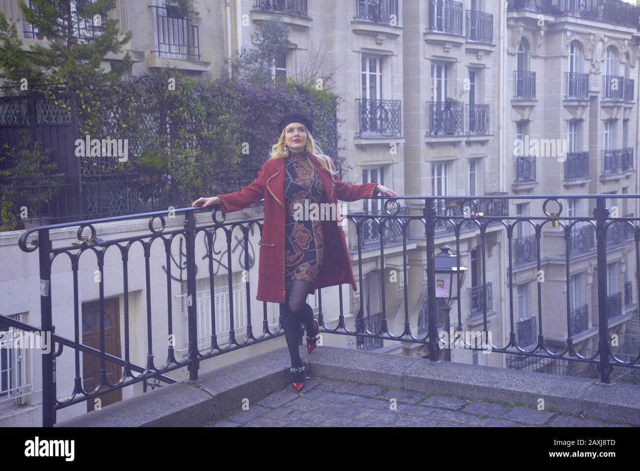 Woman in black coat beret hi-res stock photography and images - Alamy