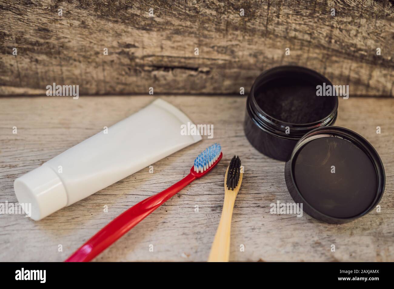 Activated charcoal powder VS plastic brush and toothpaste for brushing