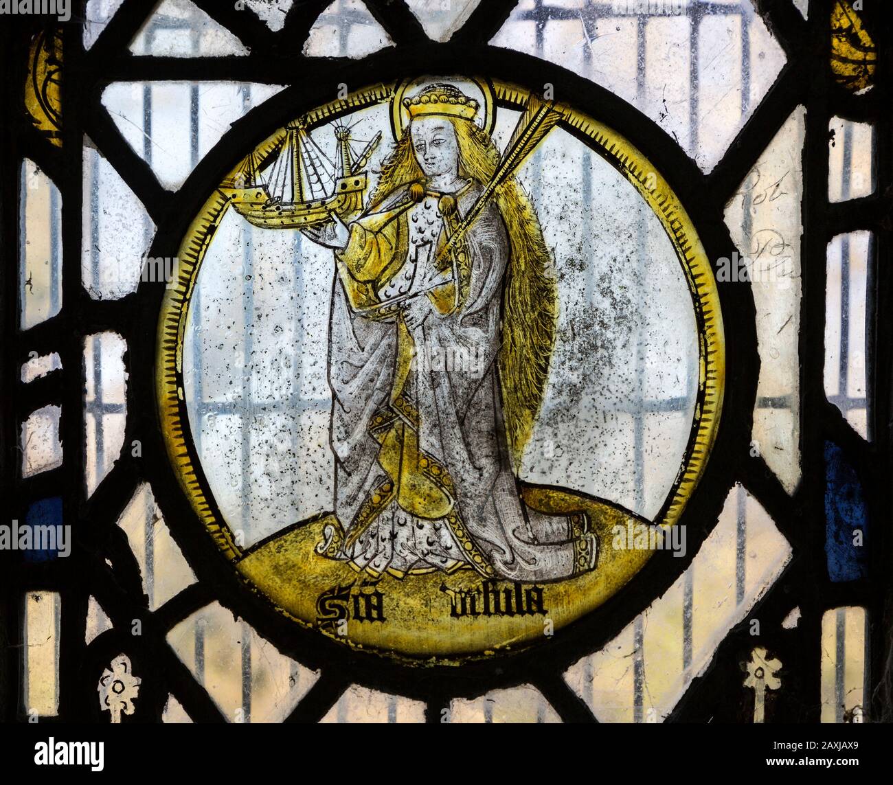 Saint Ursula medieval stained glass window roundel inside the church at