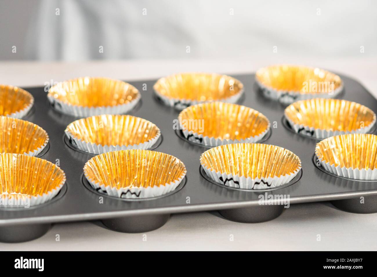 Baking chocolate cupcakes in cupcake pan Stock Photo Alamy
