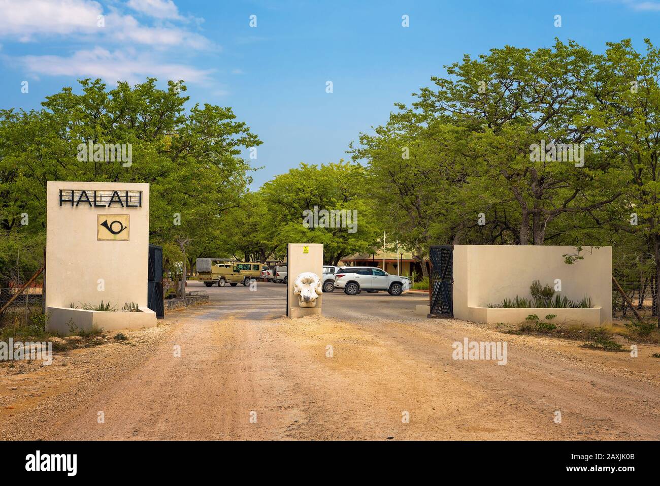 Entry gate of the Halali resort and campsite in Etosha National Park Stock Photo