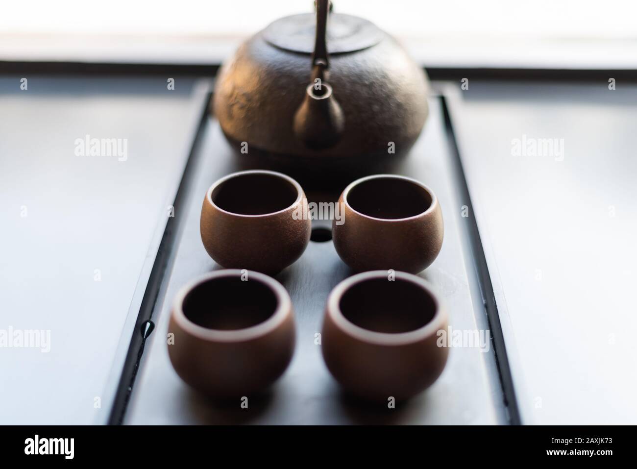Traditional Chinese tea Set up with ceramic tea cups Stock Photo