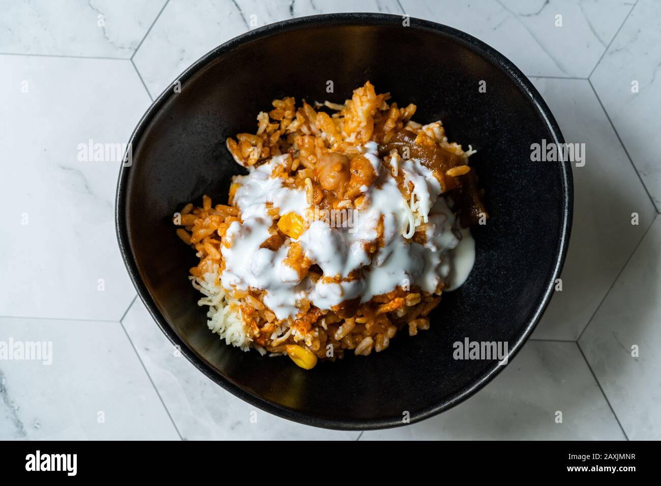 Mexican Rice with Kidney Bean, Sour Cream, Grated Mozzarella Cheese and